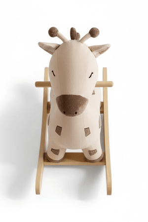 Freddie the Giraffe Rocker seen from directly above and in front, showing the face, horns, wooden handle and curved rockers
