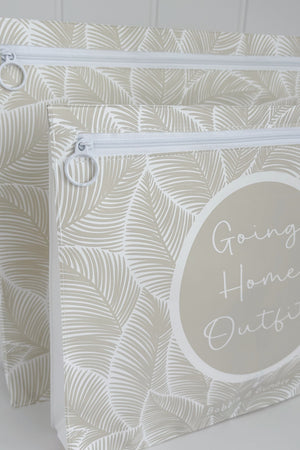 Hospital bag organiser pouches, beige leaf, two pouches standing side by side, front one labelled Going Home Outfit