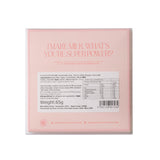The back of a light pink packaged chocolate product on a white background, featuring the text 'MAKE MILK WHAT'S YOU'RE FOR POWER?' and product details including weight and a barcode.