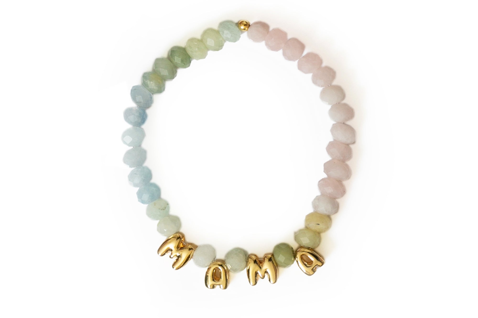 A beaded stretch bracelet featuring pastel green, light blue, and pale pink stones with gold letter charms spelling 'MAMA' on a white background.