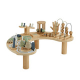 Wooden activity table, natural: full view on white showing wooden hand, bead runs, gears, maze track and seesaw figures