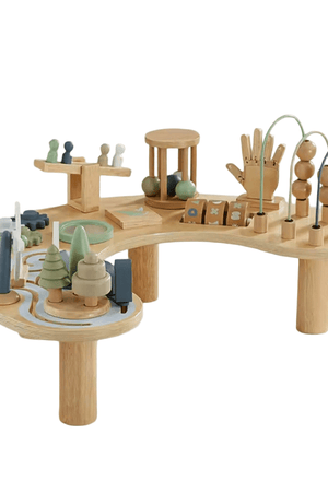 Wooden activity table, natural: full view on white showing wooden hand, bead runs, gears, maze track and seesaw figures