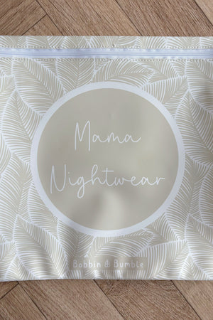Hospital bag organiser pouches, beige leaf, flat pouch labelled Mama Nightwear on a wooden floor