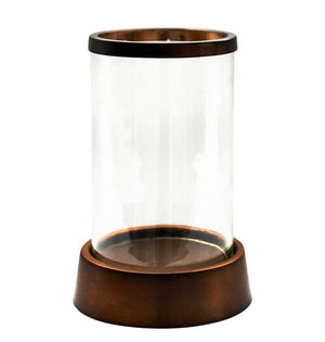 Palm Beach Hurricane Lantern with a clear glass cylinder and a copper-toned base and rim, on white