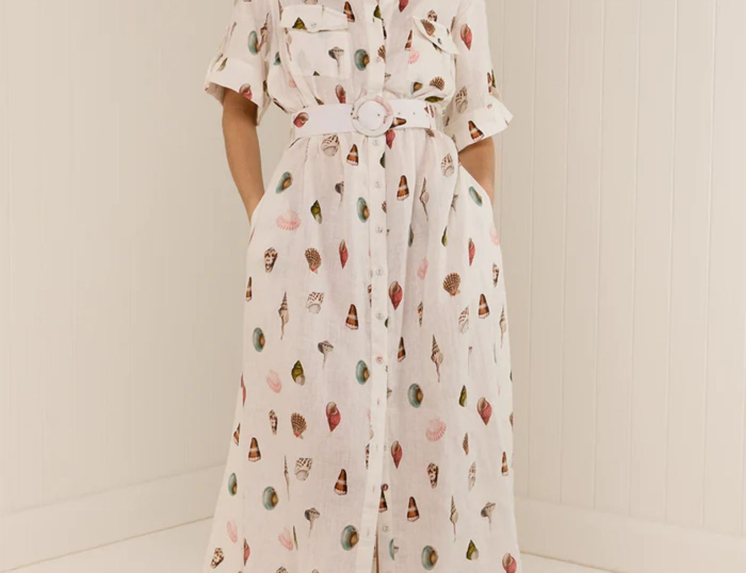 Model wearing Memento Dress in Sardinia Shells print by Palm Noosa 
