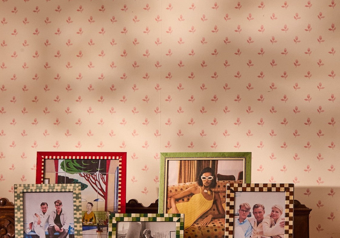 Rustic Brown Checked Photo Frame 7x5 displayed on a carved wooden table alongside red, green and wood-effect frames
