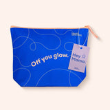 A bright blue zippered pouch with white abstract line drawings and the text 'Off you glow.' on the front, featuring a lavender hangtag that reads 'Hey Mama.