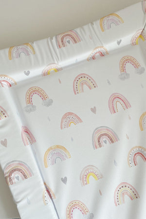 Standard Changing Mat Beau Rainbow Print close-up of the rainbow and heart pattern and the raised foam edges