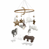 Safari Dreams Felt Cot Mobile on a white background, with a wooden ring, gold moon and stars, clouds and safari animals
