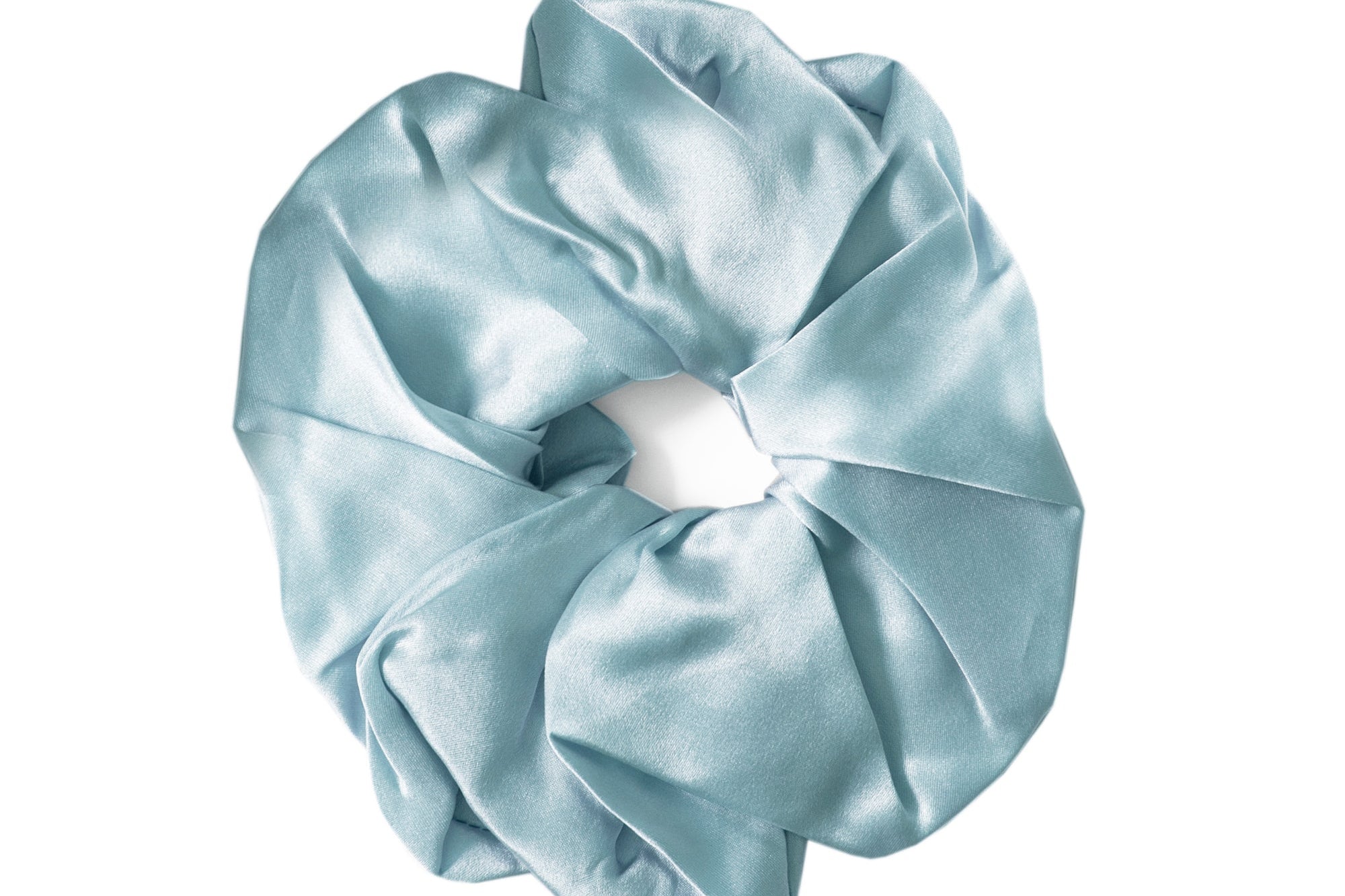 A single light blue satin hair scrunchie on a solid white background.