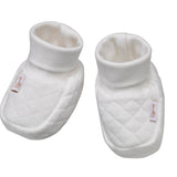 Sophie la girafe My Birth Outfit Gift Set white quilted booties with turned-over cuffs and small giraffe tags