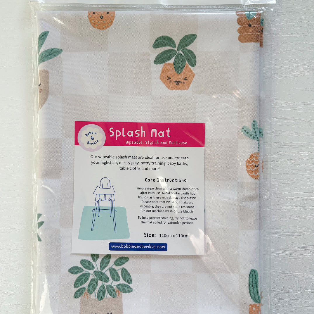 Splash Mat, Pot Plants: in its hanging retail packaging with the care instructions and 110cm x 110cm size label