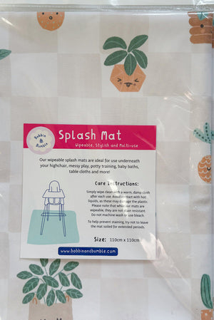 Splash Mat, Pot Plants: in its hanging retail packaging with the care instructions and 110cm x 110cm size label