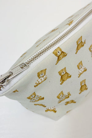 Teddy Bear Print nappy wallet, close-up of the silver zip and puller at the top corner of the pouch