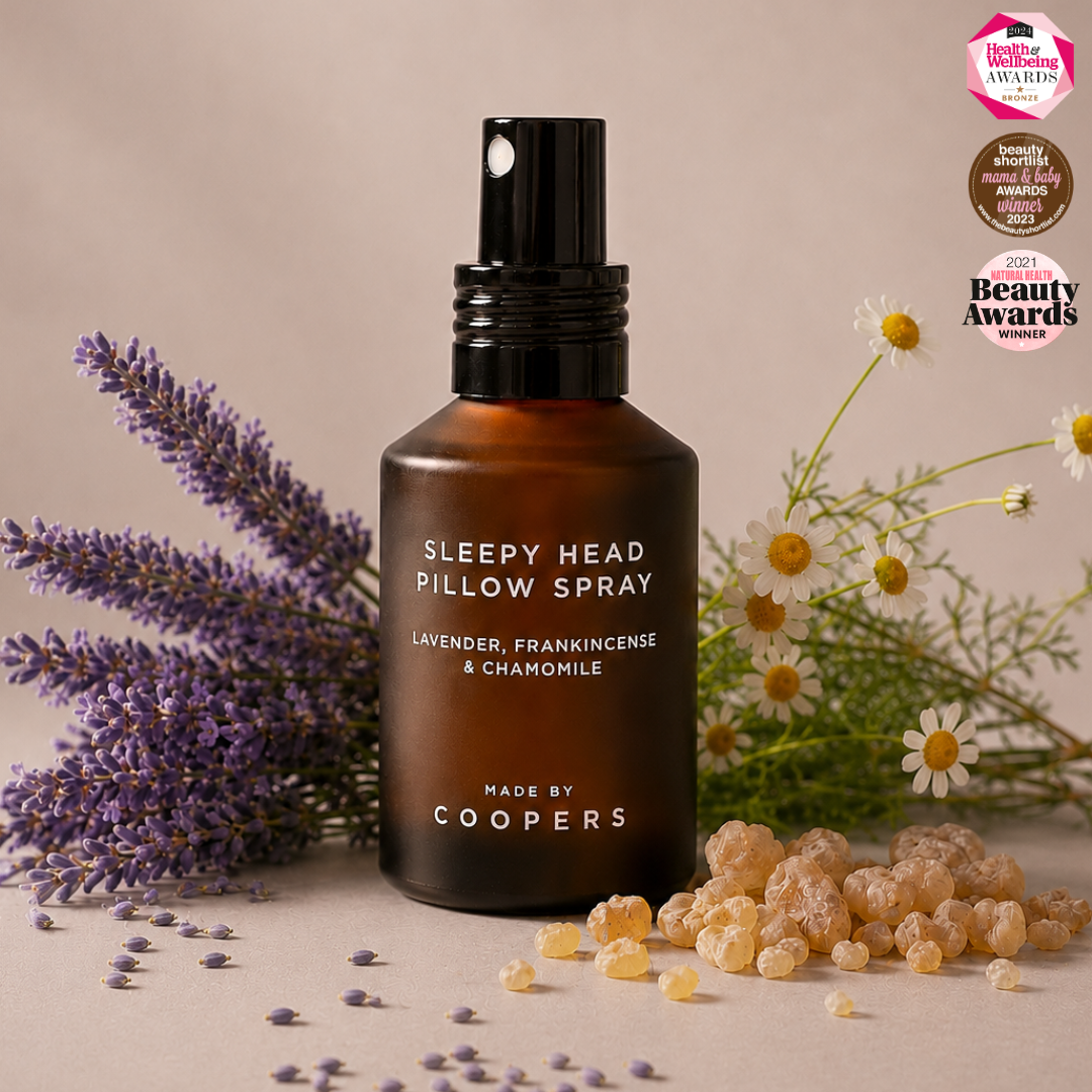 Sleepy Head Pillow Spray with lavender, chamomile and frankincense, with three award badges in the corner