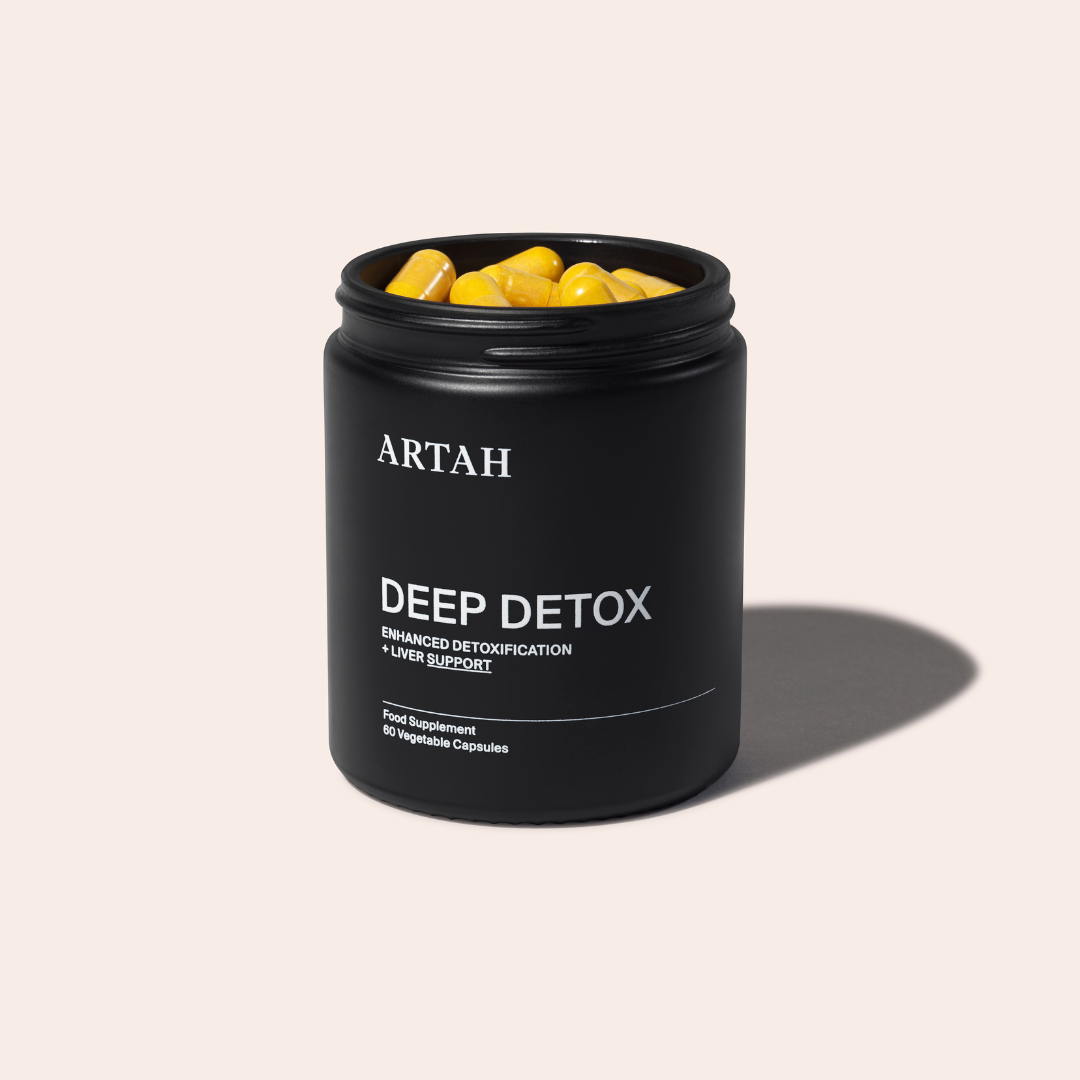 A bottle of Deep Detox by ARTAH, plus supplement capsules. This is for enhanced detoxification and liver support.