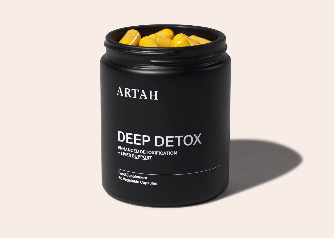 A bottle of Deep Detox by ARTAH, plus supplement capsules. This is for enhanced detoxification and liver support.