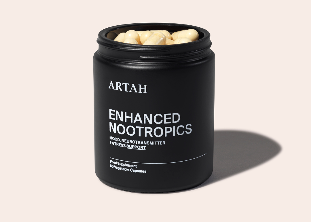 A bottle and capsules of Enhance Nootropics by ARTAH, for mood, focus and stress support